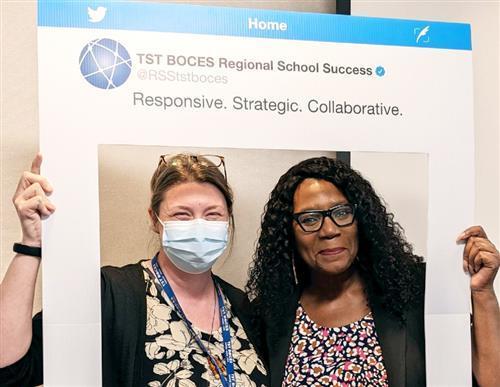 TST BOCES Coordinator of Professional Learning Emily Wemmer (left) poses with CEO of Progression Partners, Inc. Natalie McGee (right) during an Introduction to Equity Learning Walks school event to support diverse and inclusive school environments.