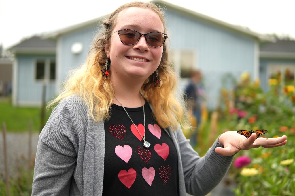 TST Students release just-hatched butterflies